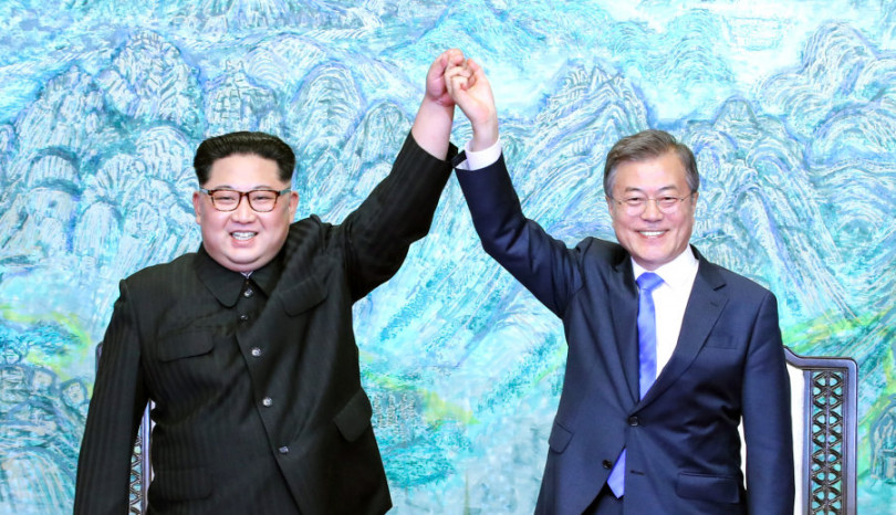 PANMUNJOM, SOUTH KOREA - APRIL 27:  North Korean leader Kim Jong Un (L) and South Korean President Moon Jae-in (R) pose for photographs after signing the Panmunjom Declaration for Peace, Prosperity and Unification of the Korean Peninsula during the Inter-Korean Summit at the Peace House on April 27, 2018 in Panmunjom, South Korea. Kim and Moon meet at the border today for the third-ever Inter-Korean summit talks after the 1945 division of the peninsula, and first since 2007 between then President Roh Moo-hyun of South Korea and Leader Kim Jong-il of North Korea.  (Photo by Korea Summit Press Pool/Getty Images)